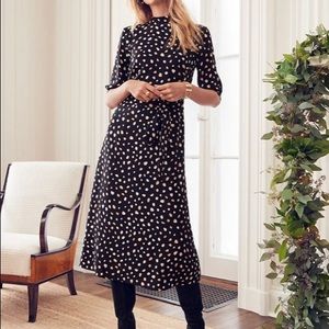 Mock neck black dress.